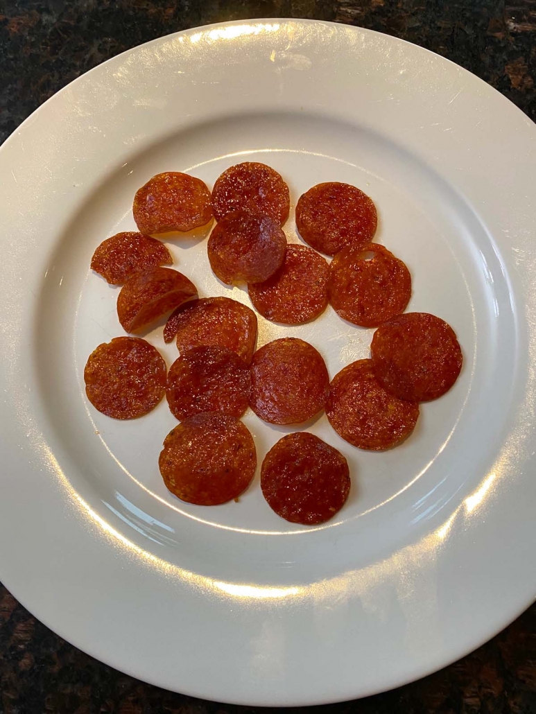 pepperoni chips resting on a plate