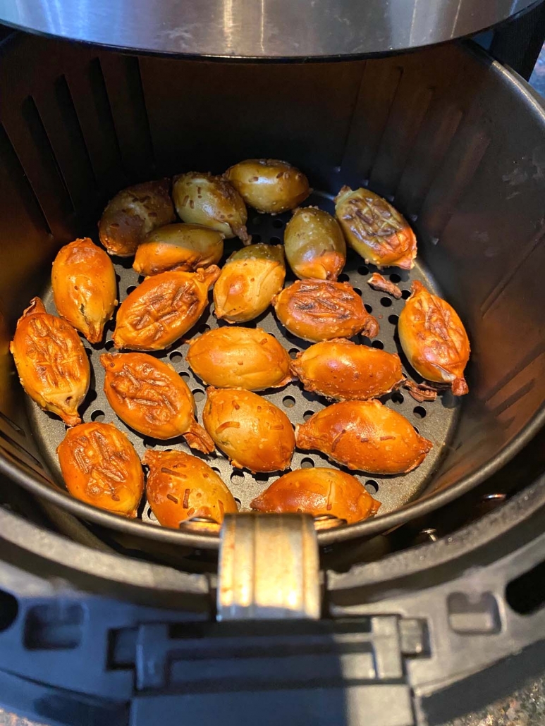 air fryer opened to show pretzel bites