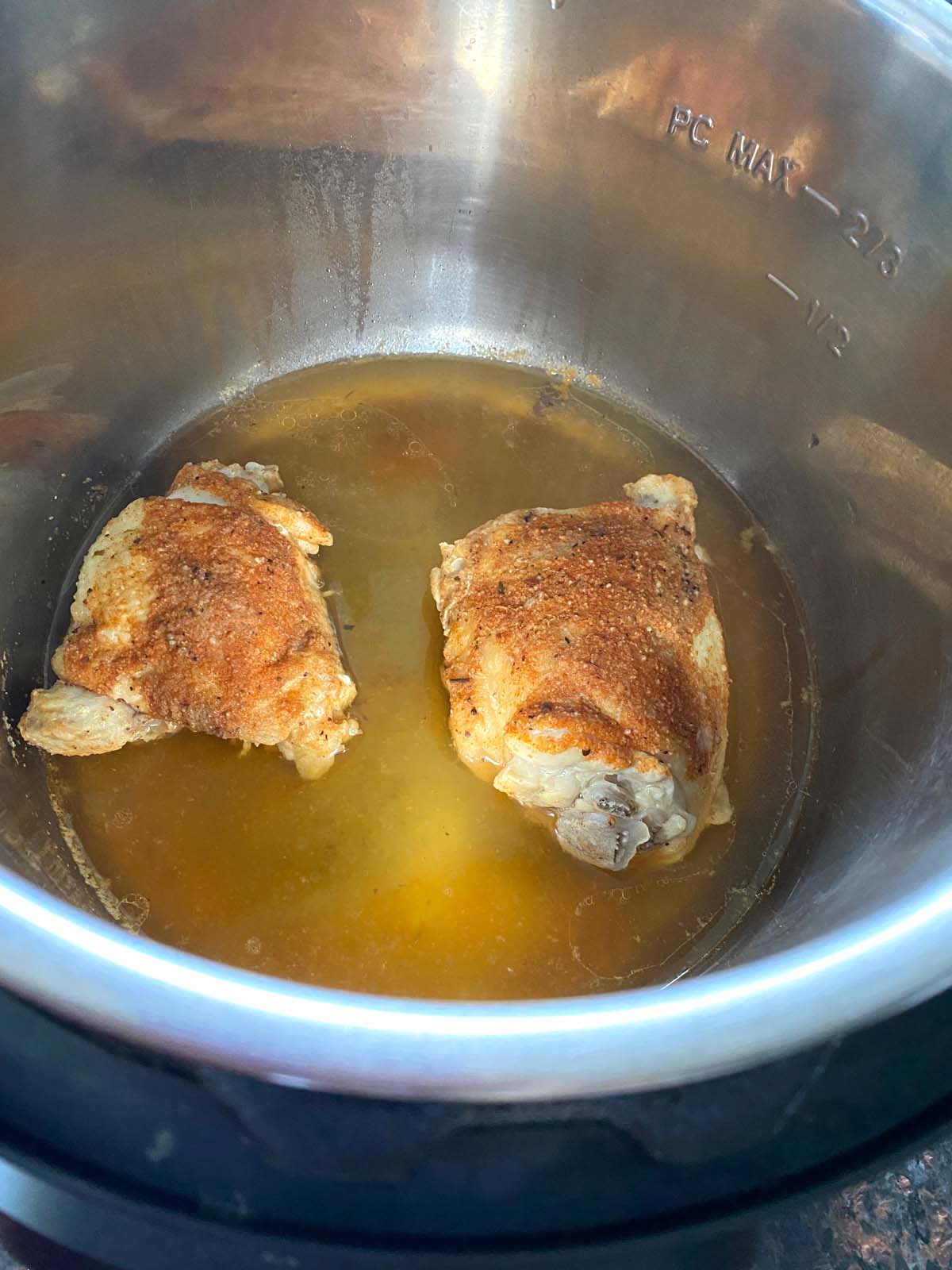 Cooked chicken thighs in an Instant Pot. 