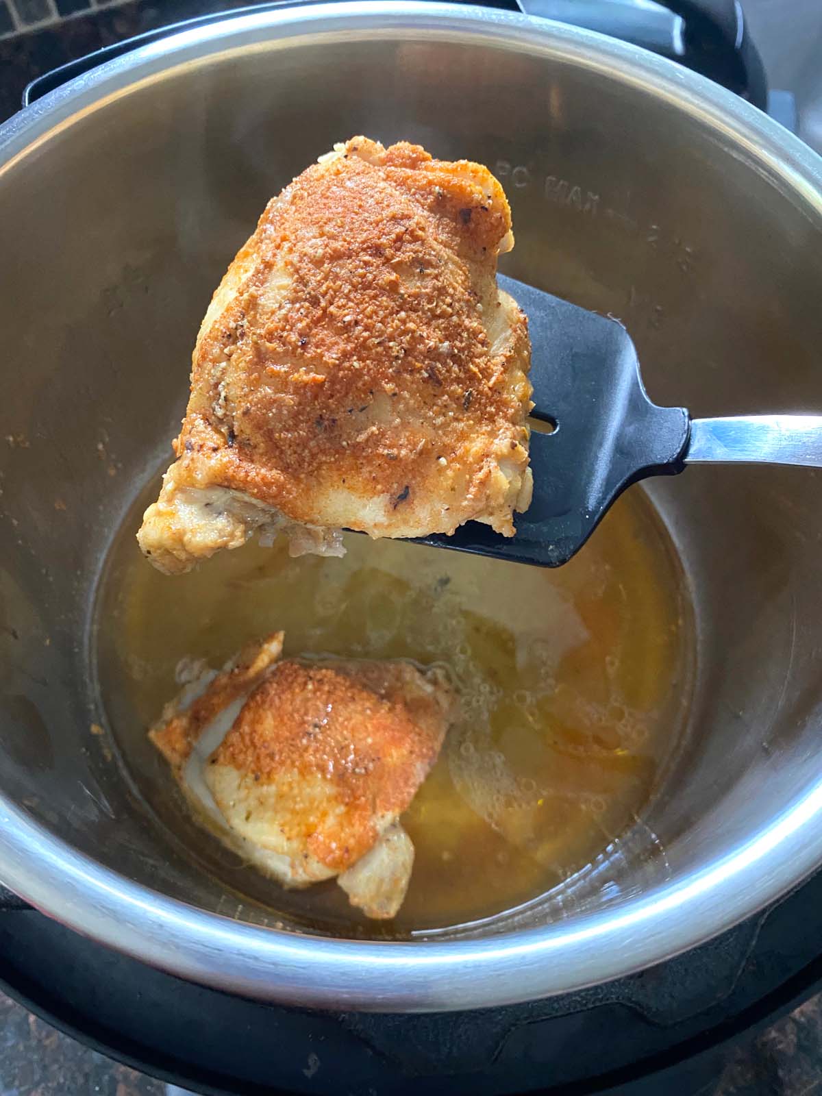 Cooked chicken thighs in an Instant Pot. 