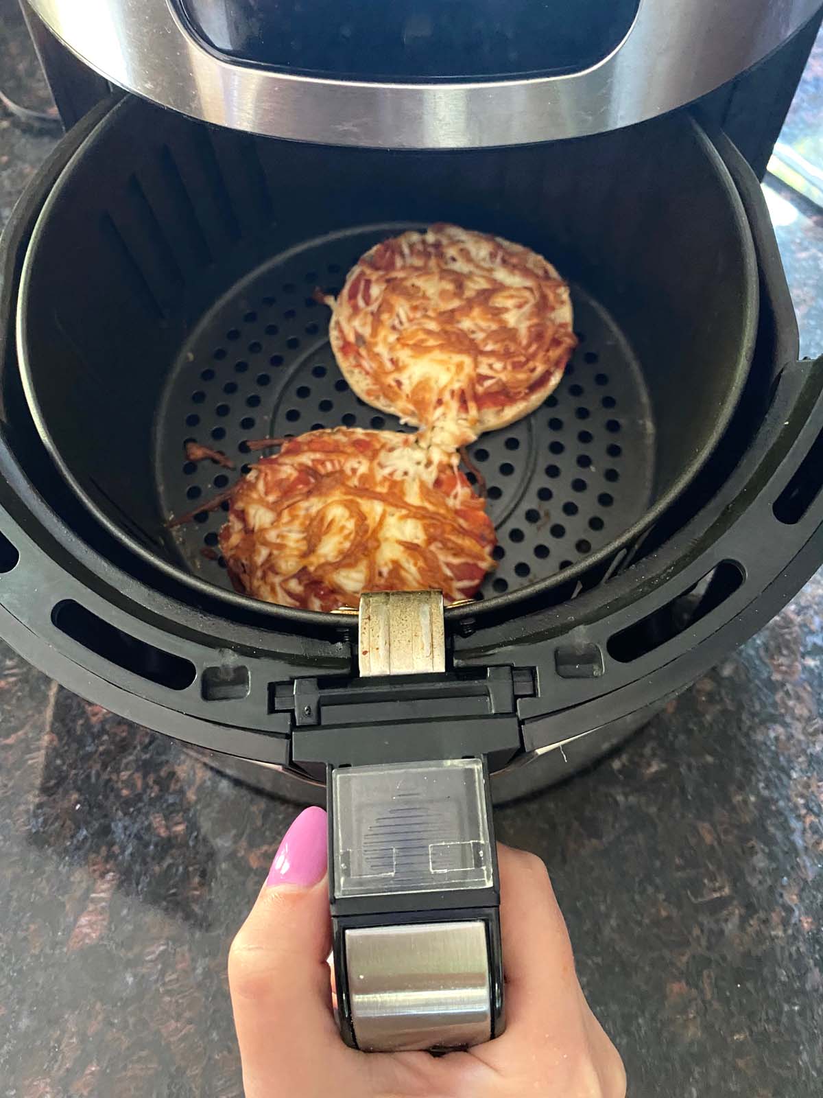 English muffin pizzas in an air fryer.