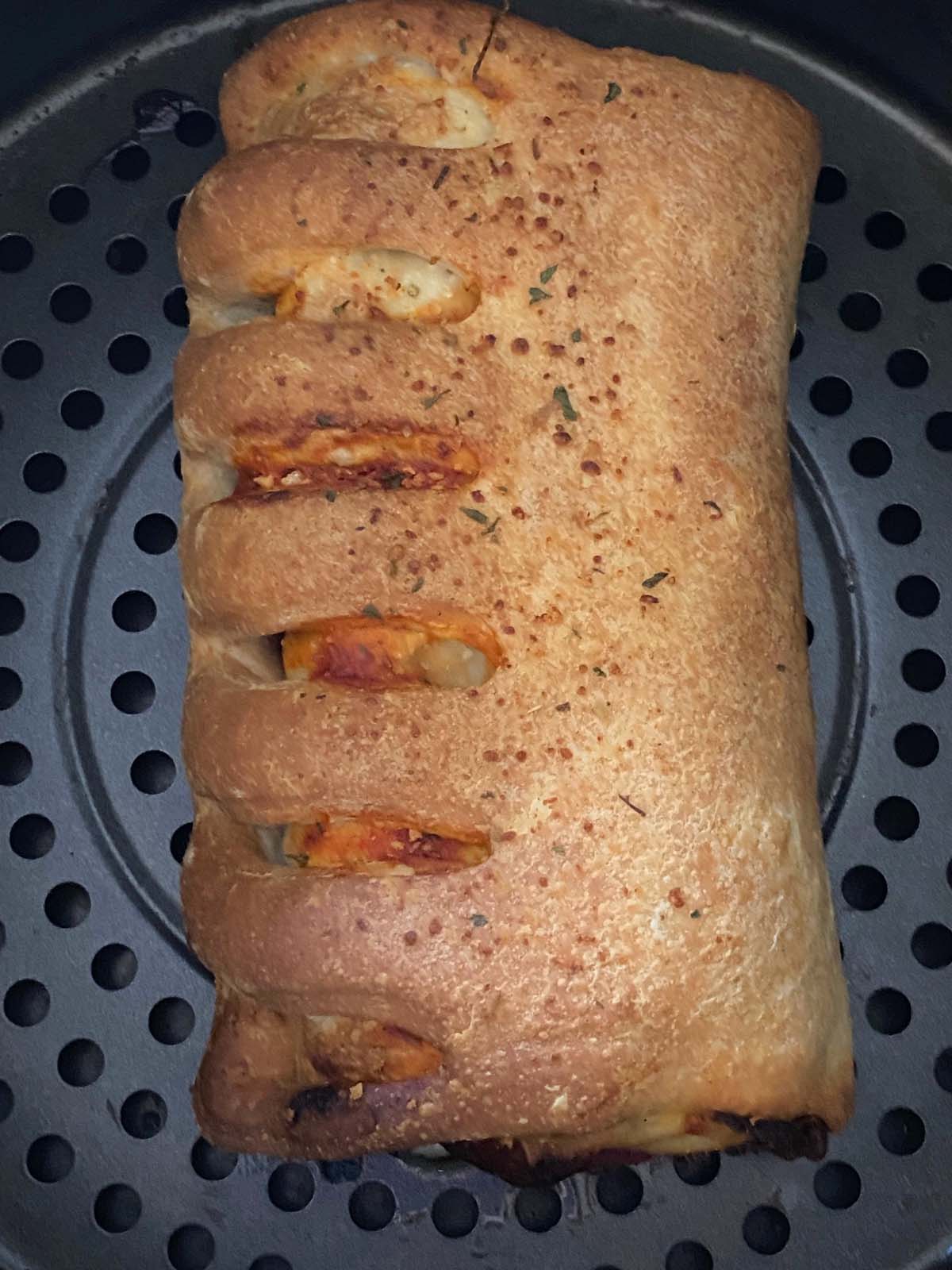 Cooked stromboli in the air fryer.