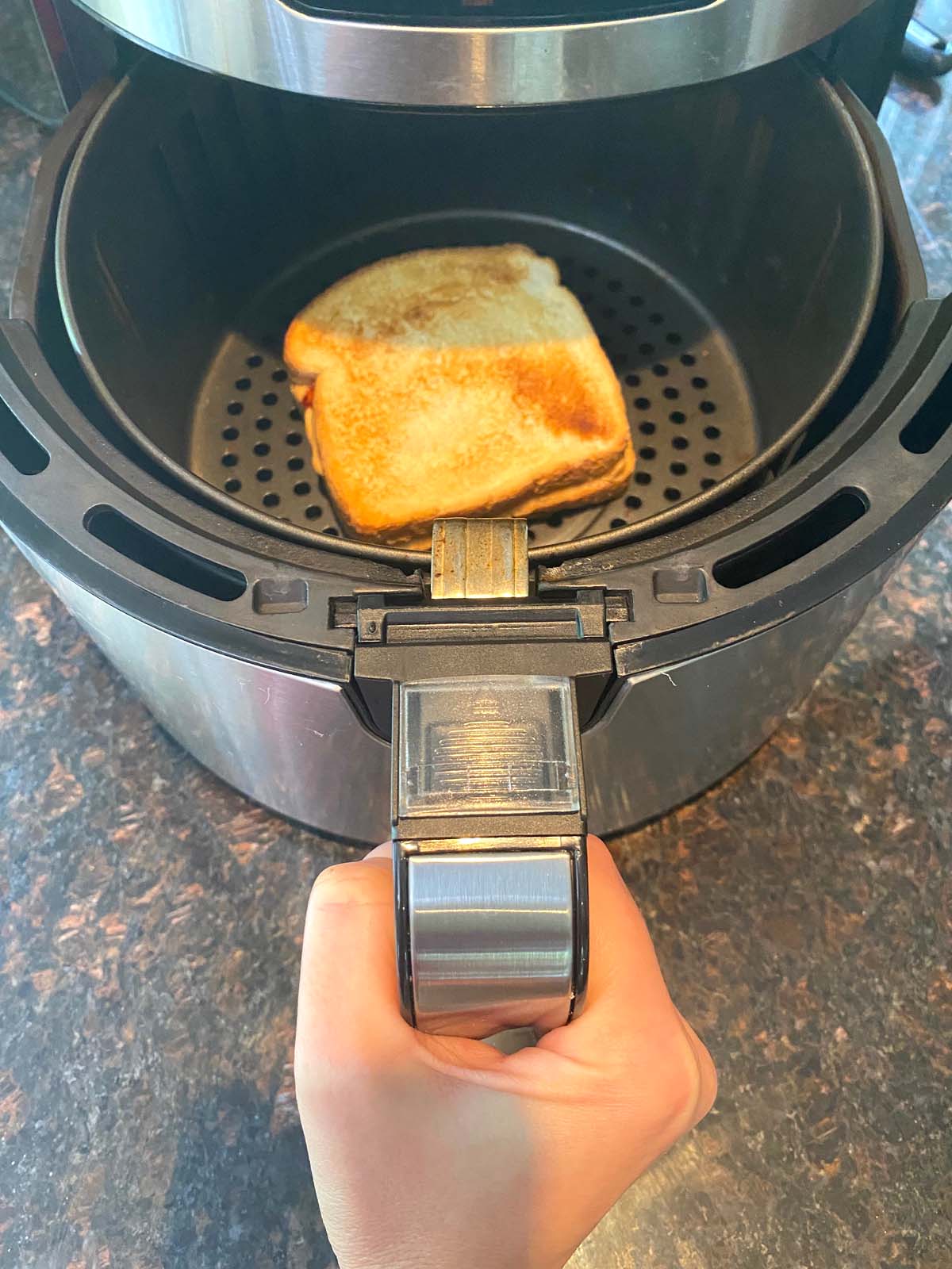 Toasted peanut butter and jelly in an air fryer.