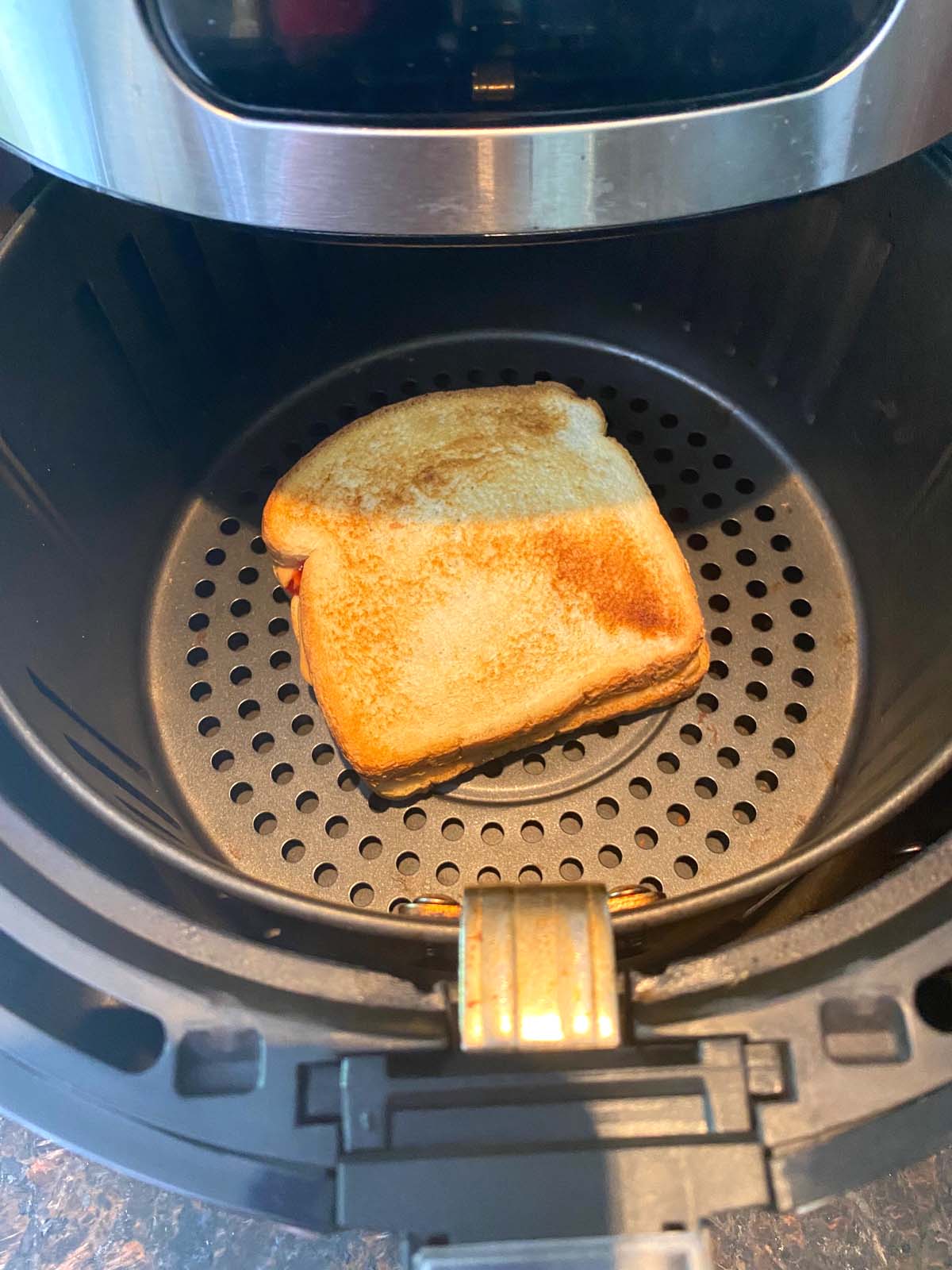 Toasted peanut butter and jelly in an air fryer.