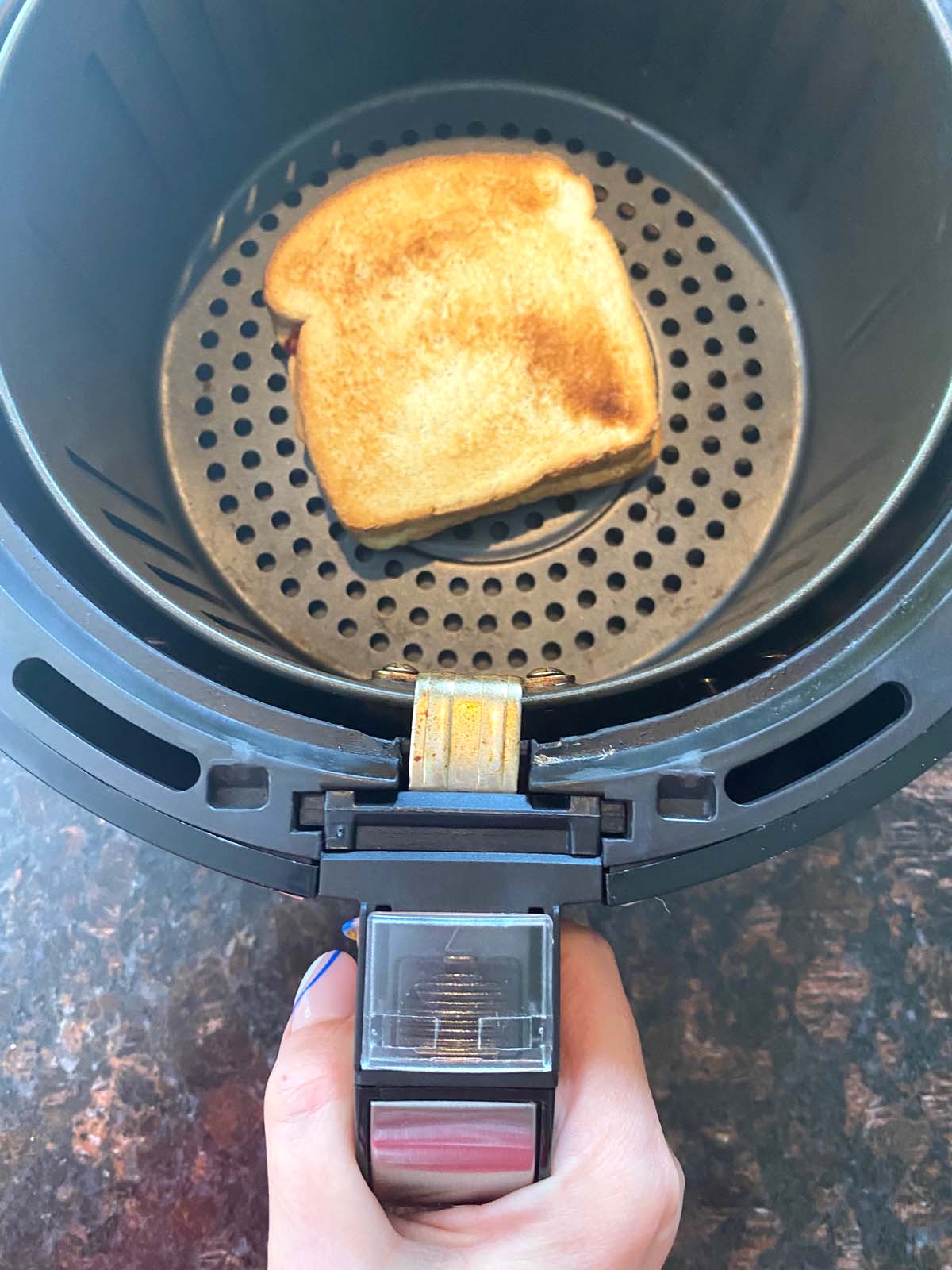 Toasted peanut butter and jelly in an air fryer.