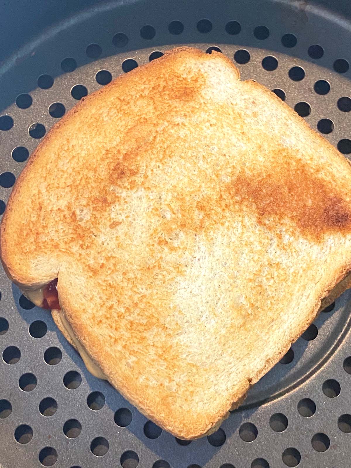 Toasted peanut butter and jelly in an air fryer.