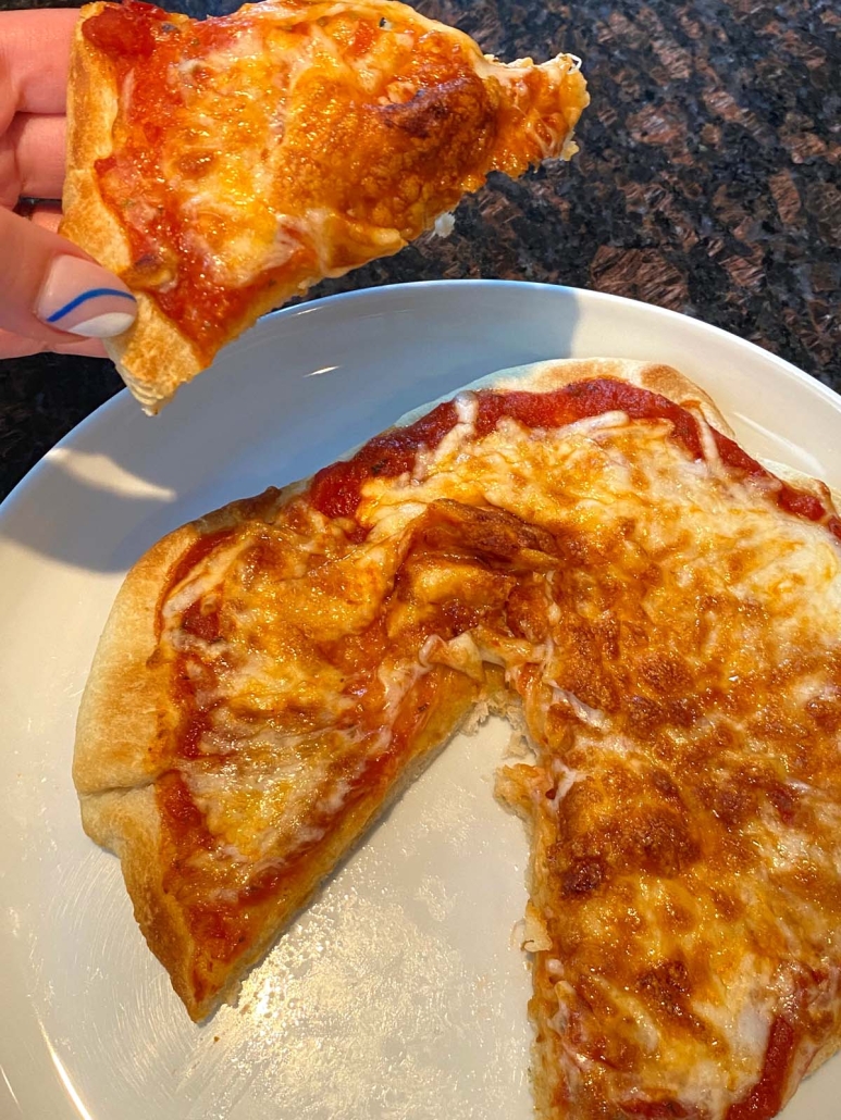 cooked pizza on plate