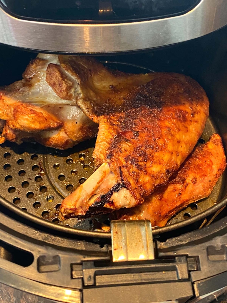 air fryer opened to show turkey wings