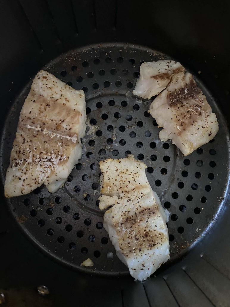 close-up of frozen cod cooked in air fryer