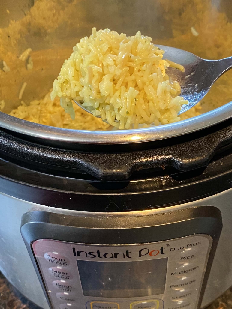 spoon scooping out Instant Pot Rice-A-Roni