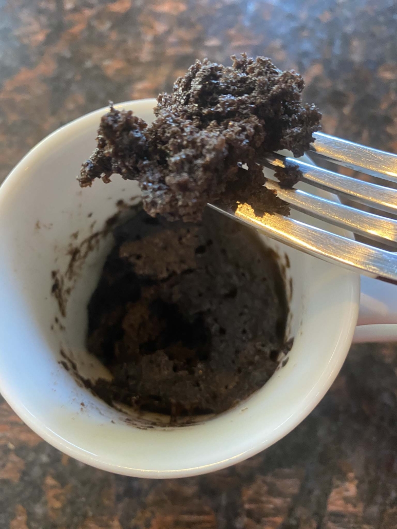 fork digging into an oreo mug cake