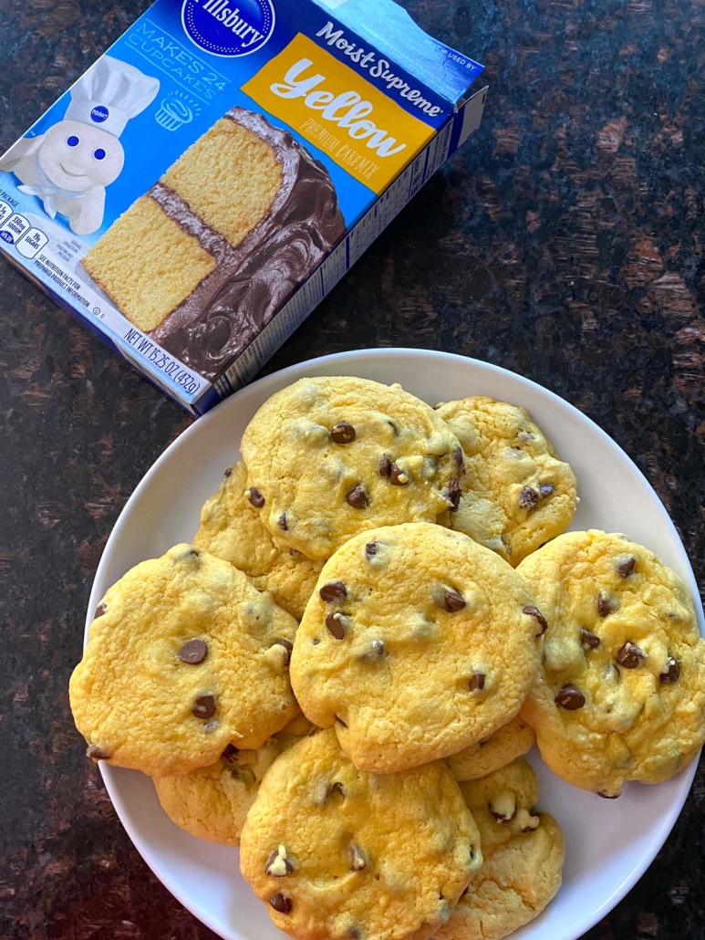 yellow cake mix cookies next to cake mix box