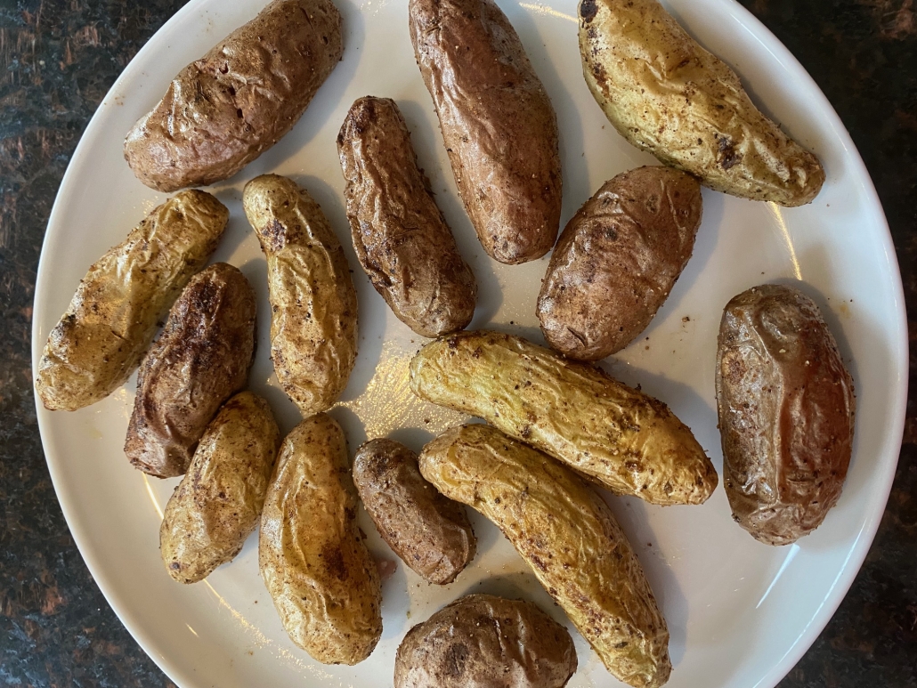 cooked fingerling potatoes on plate