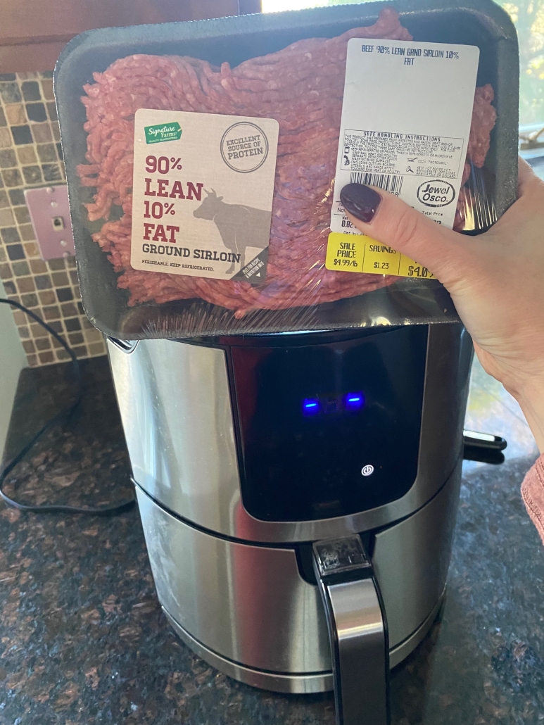 package of ground beef in front of air fryer