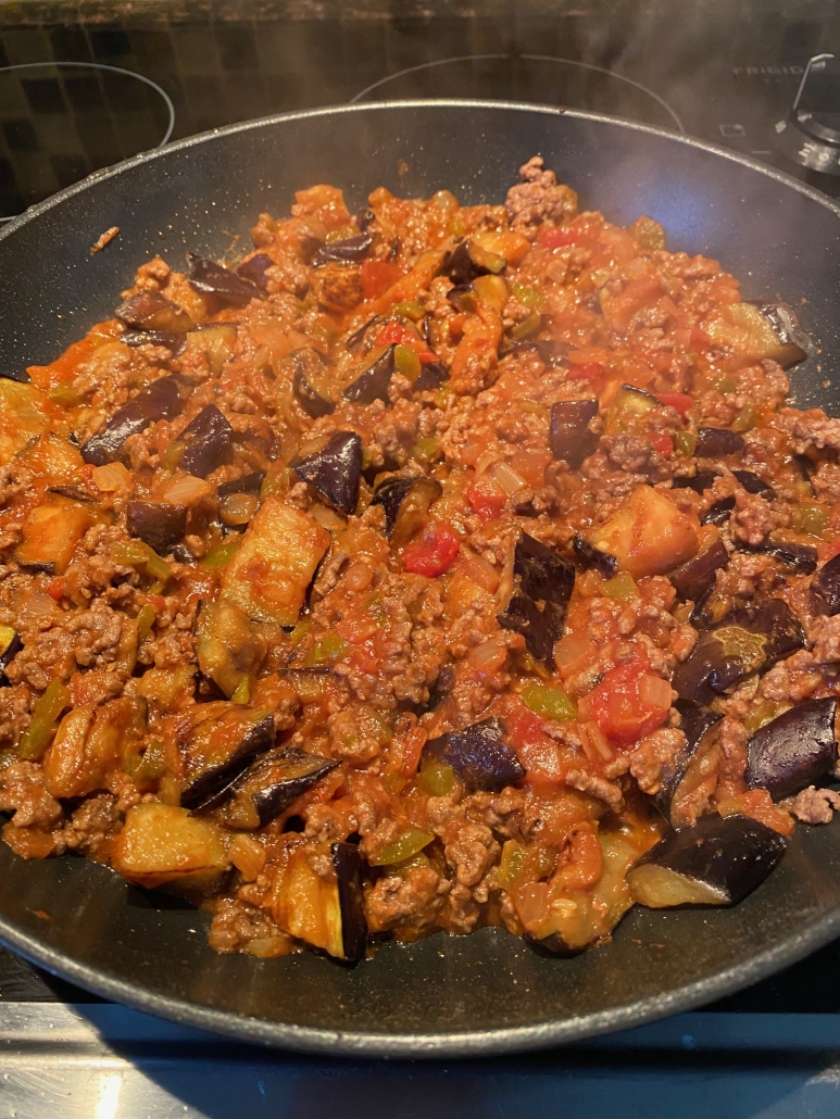 ground beef and eggplant in skillet