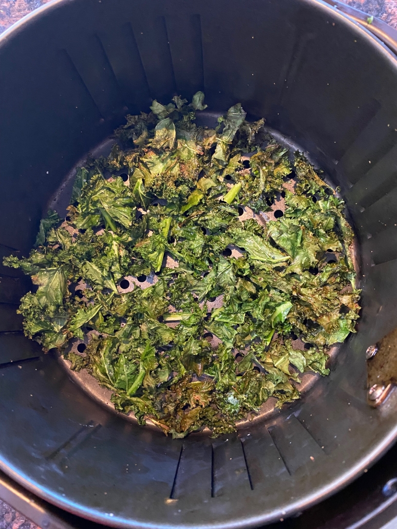 seasoned kale chips in air fryer basket
