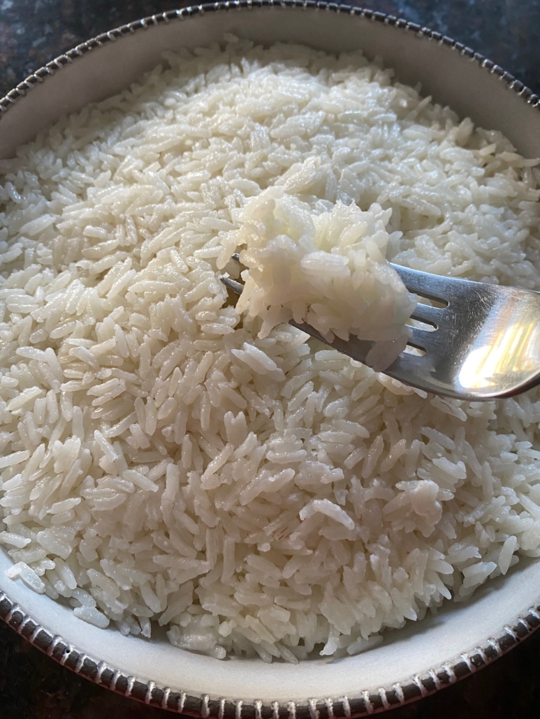 forkful of cooked coconut rice