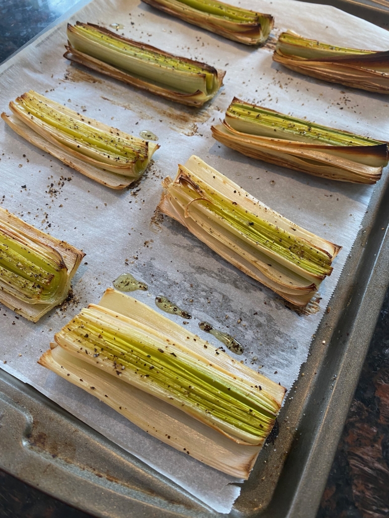 close-up of seasoned, sliced roasted leeks