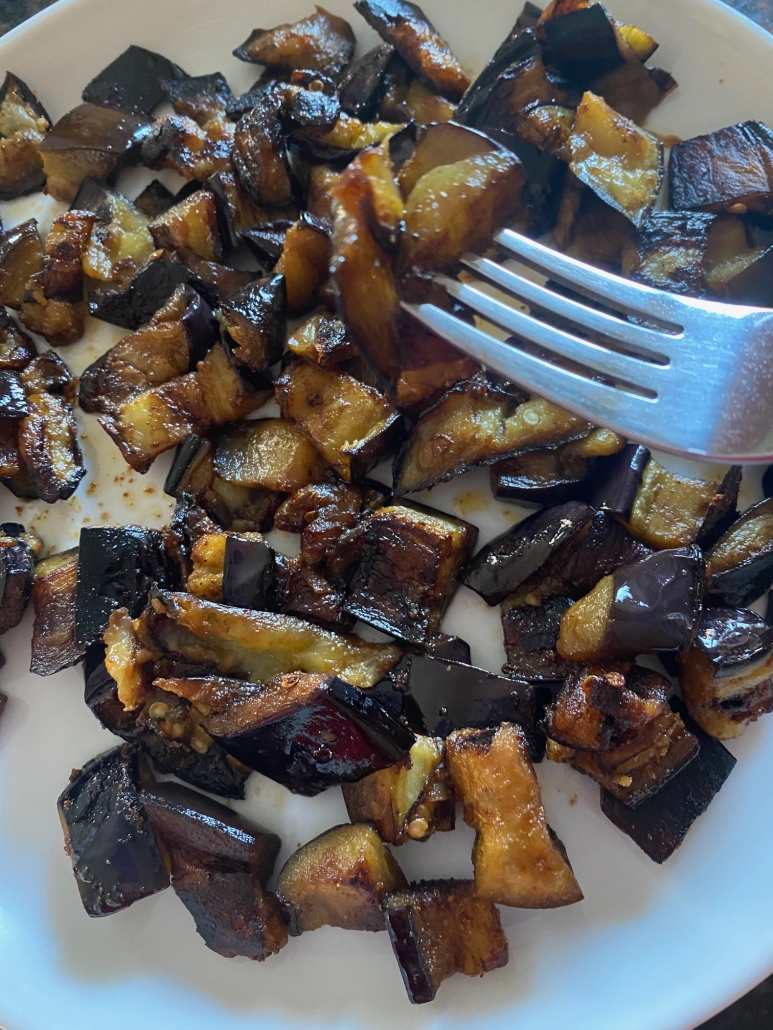 sautéed eggplant seasoned with soy sauce, garlic powder, and red pepper