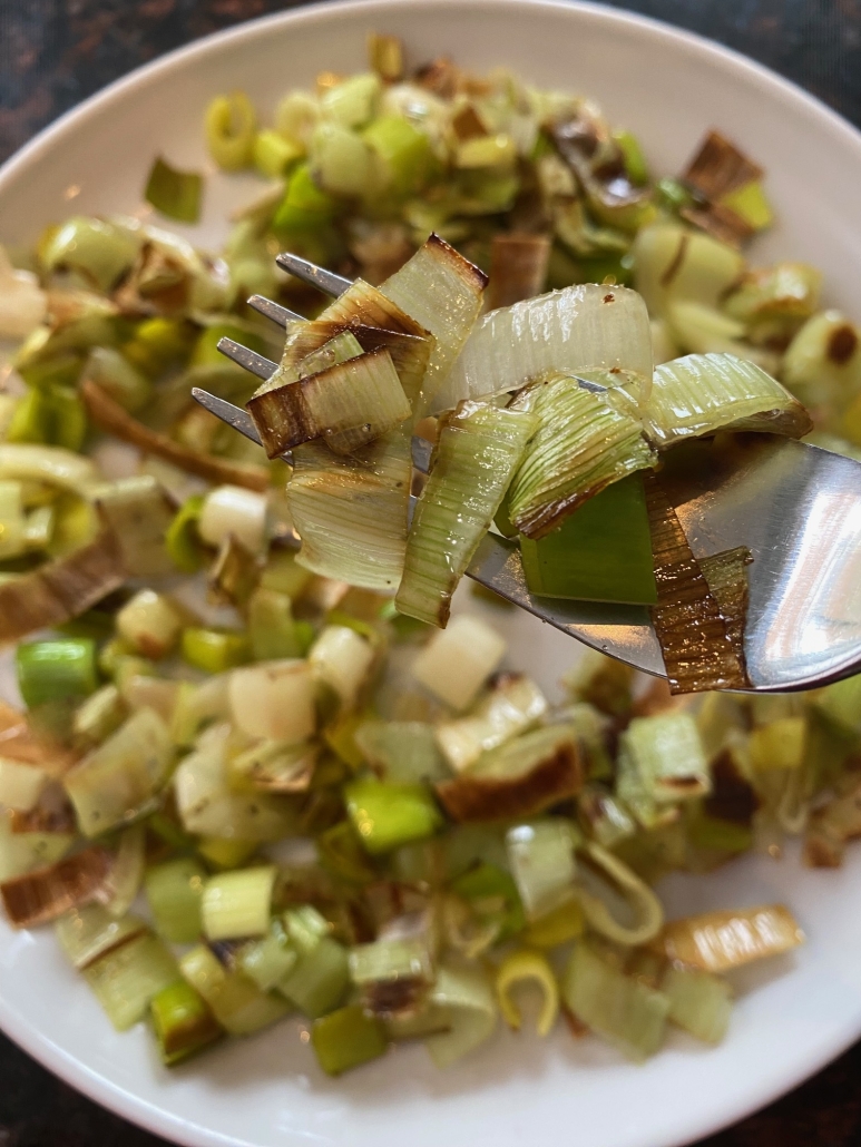 seasoned, sautéed leeks on a plate