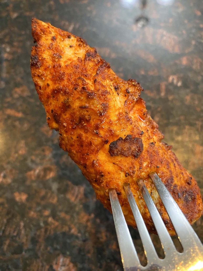 fork holding air fryer chicken tender