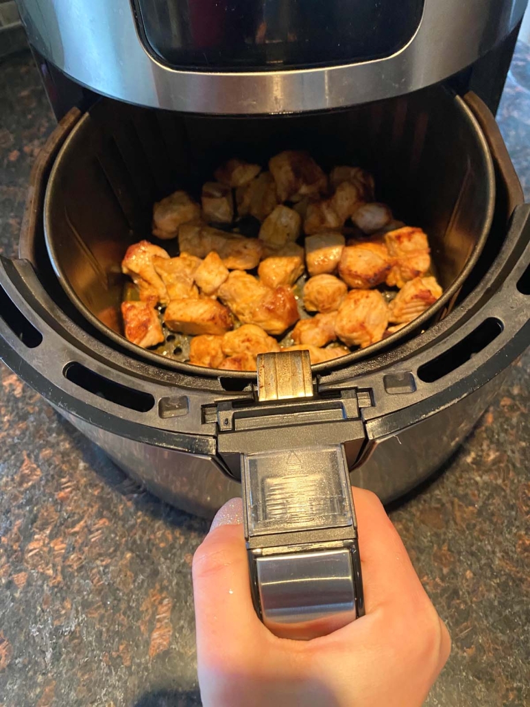 seasoned pork bites in air fryer basket