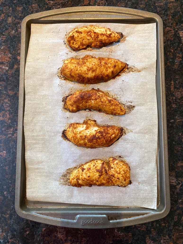 Baked Chicken Tenders on a baking sheet