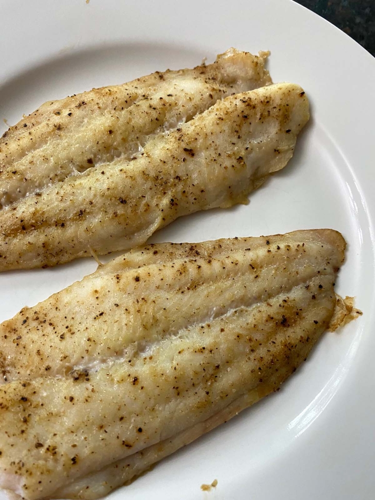 Baked Swai Fish seasoned with salt, pepper, and garlic powder