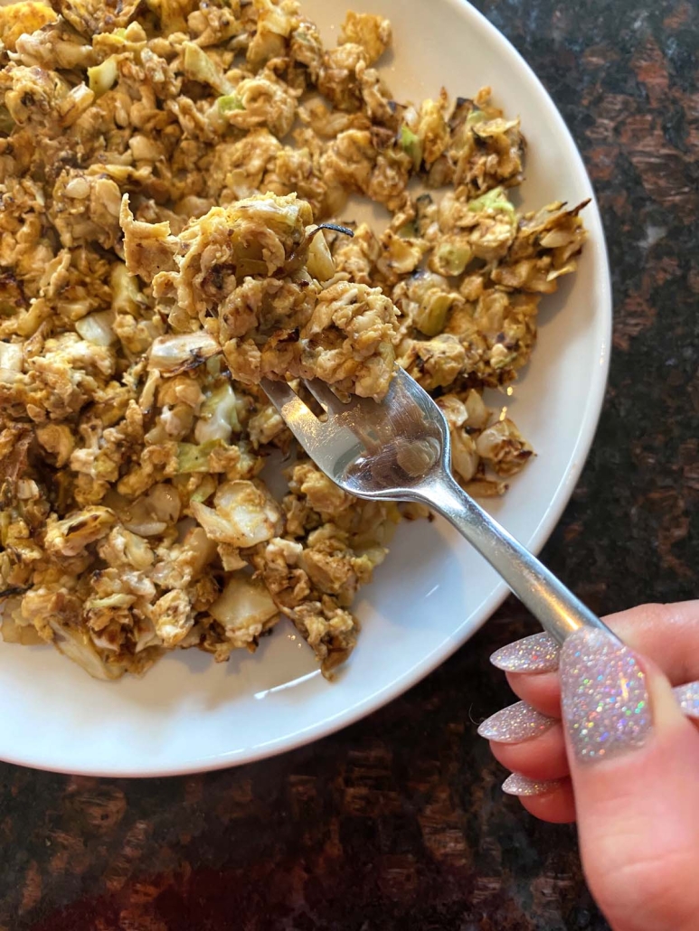 forkful of pan fried Cabbage And Eggs