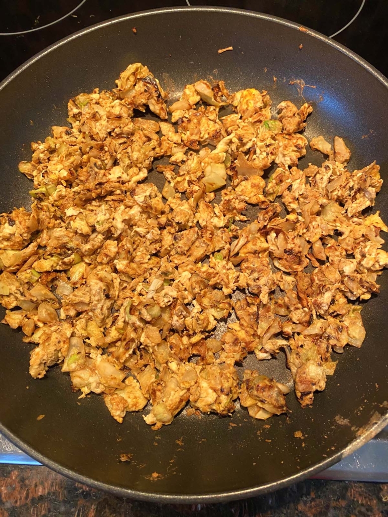 seasoned Cabbage And Eggs in a pan