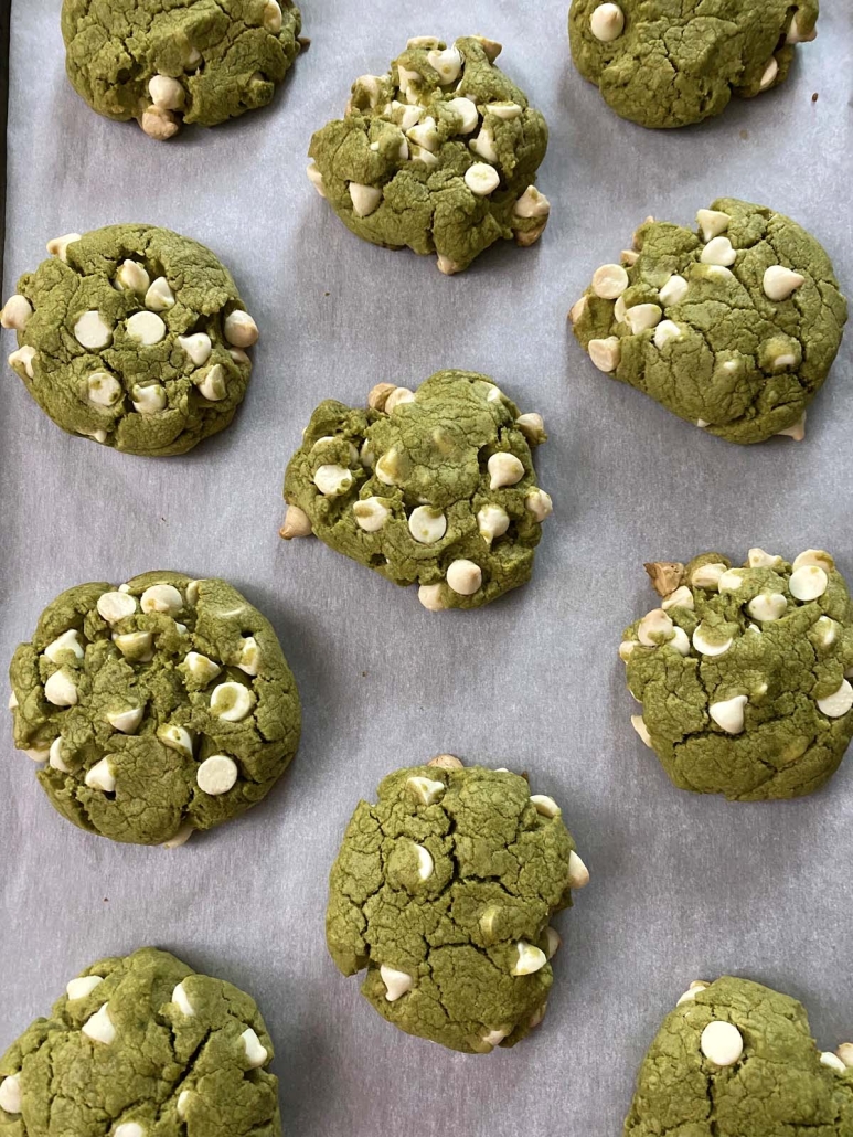 matcha cookies baked on baking sheet