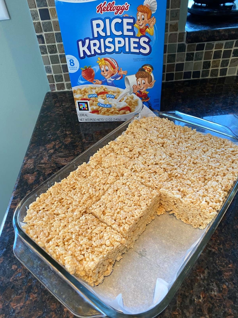 no-bake Microwave Rice Krispie Treats in front of Rice Krispies cereal box