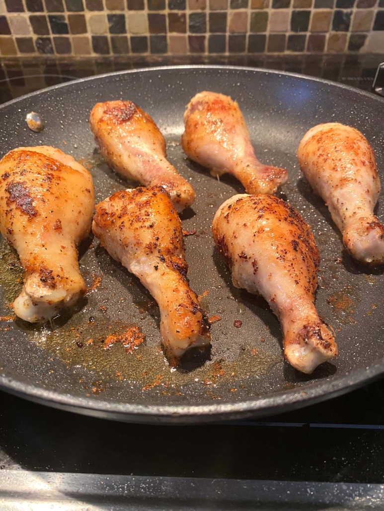 Fried Chicken Drumsticks in a pan