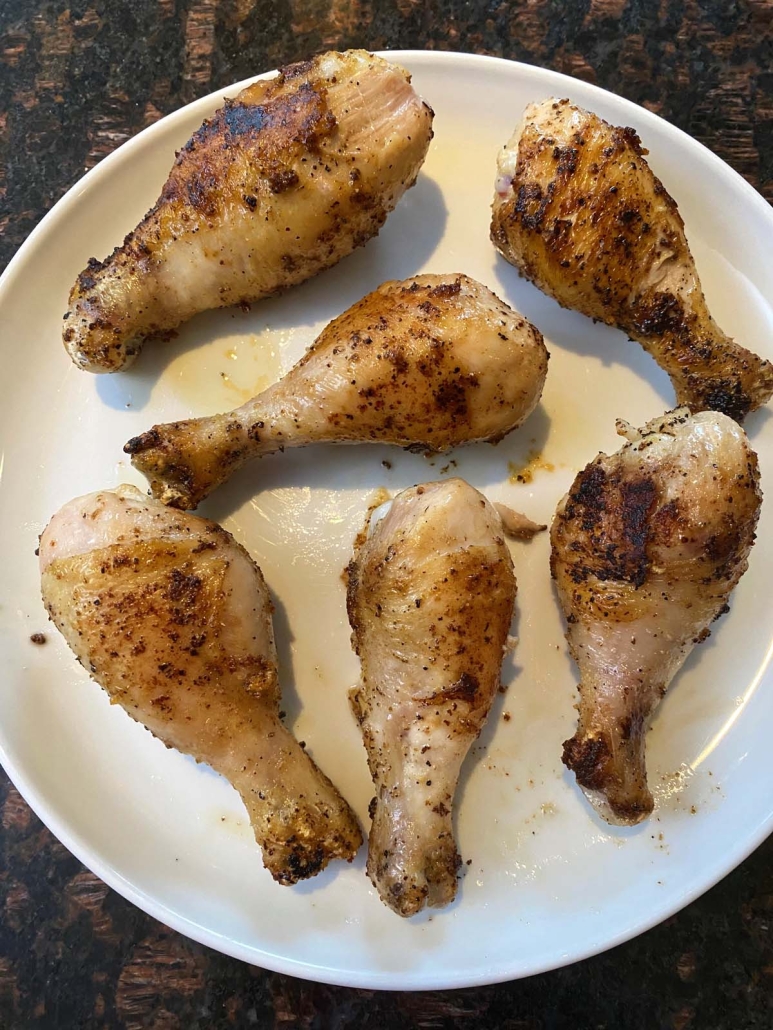 Pan Fried Chicken Drumsticks on a serving plate