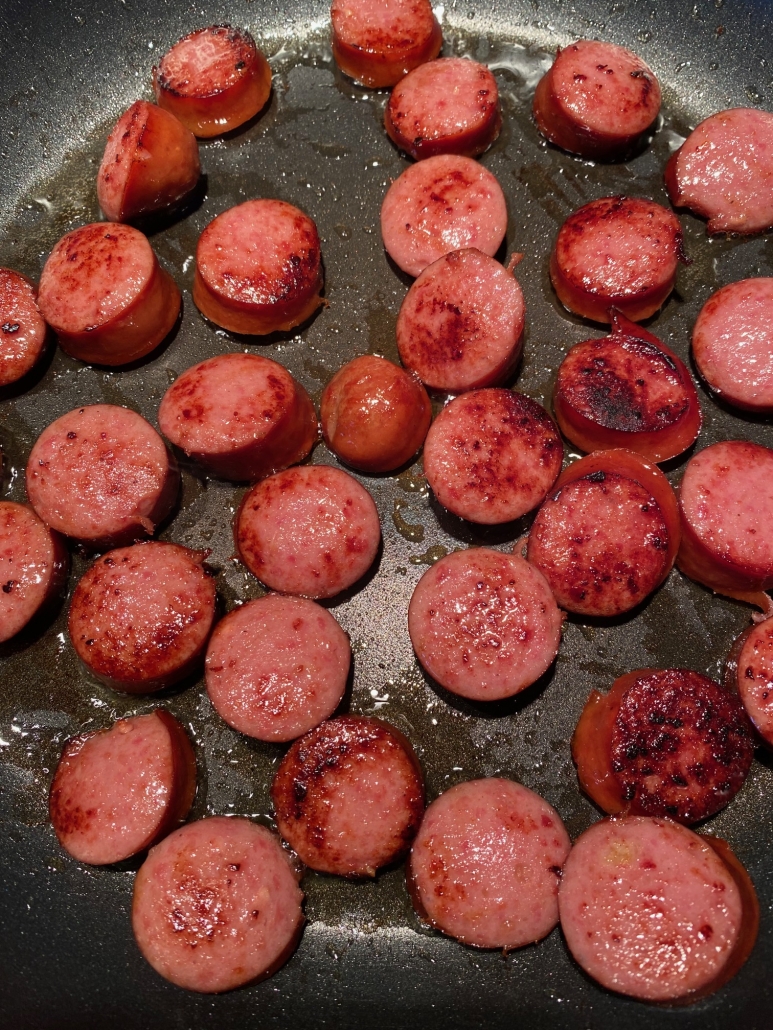 close-up of kielbasa in a skillet