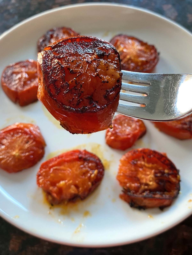 fork holding slice of Pan Fried Tomato