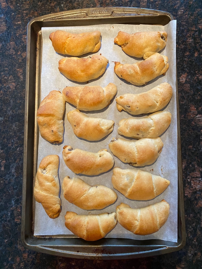 baking sheet with Sausage Cream Cheese Crescent Rolls