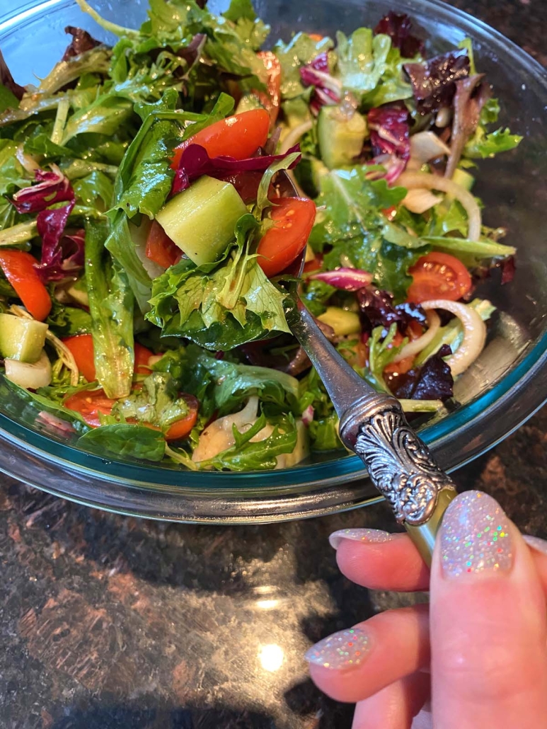 fork in a bowl of Spring Mix Salad