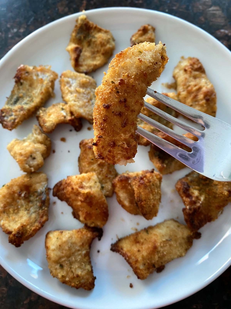 fork holding catfish nugget