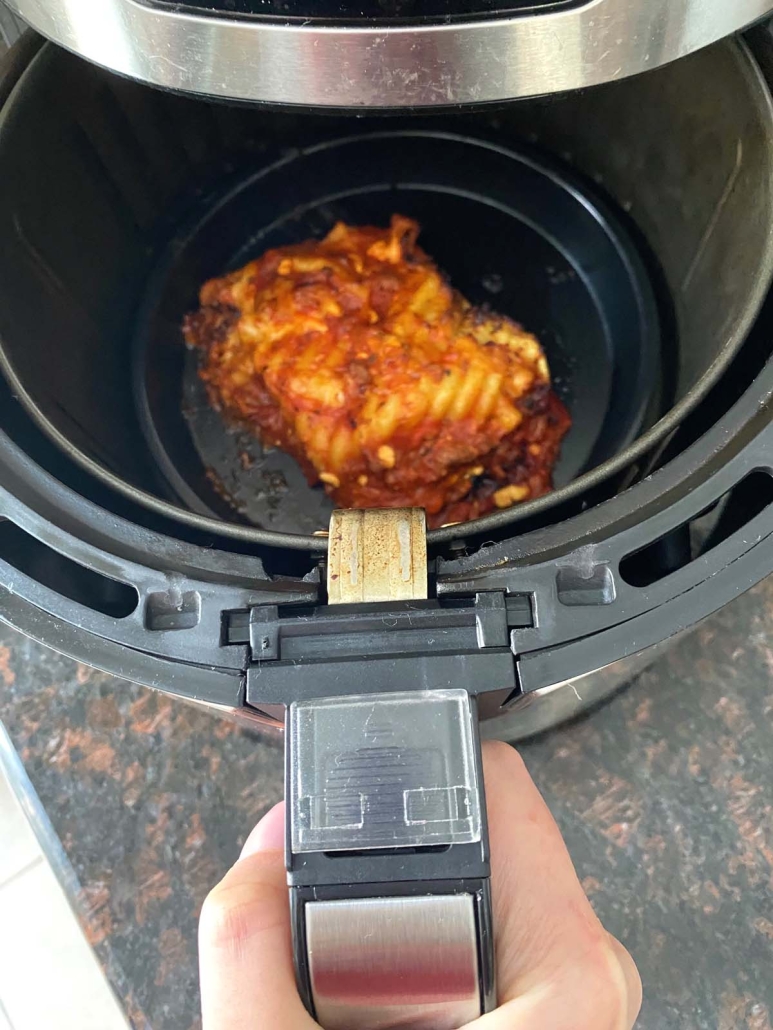 Air Fryer opened to show Frozen Lasagna inside