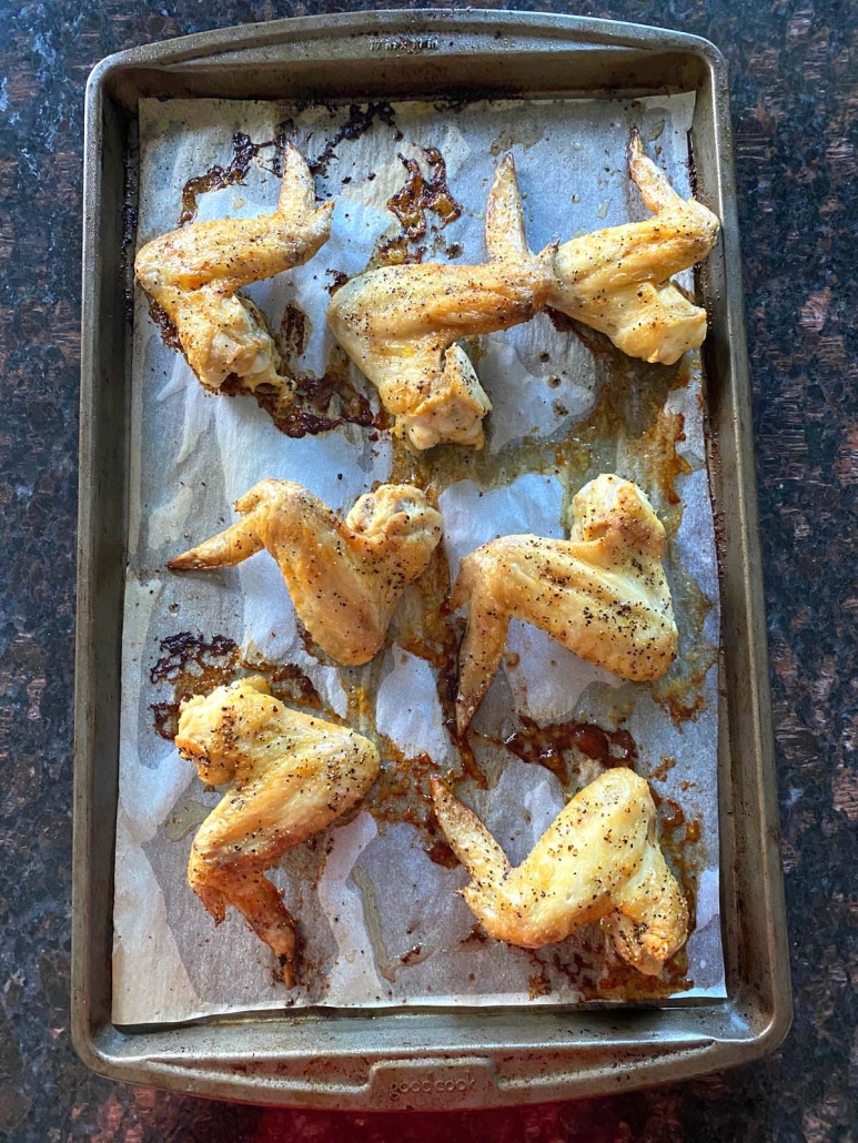 Lemon Pepper Wings on a baking sheet