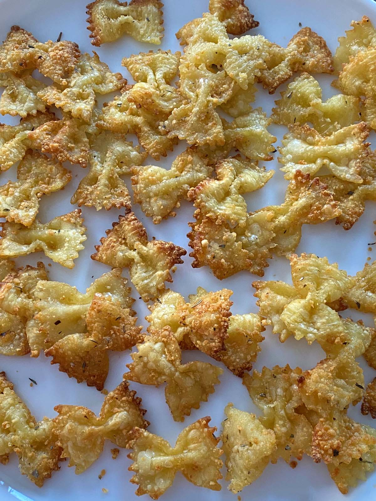 Air fryer pasta chips on a plate.