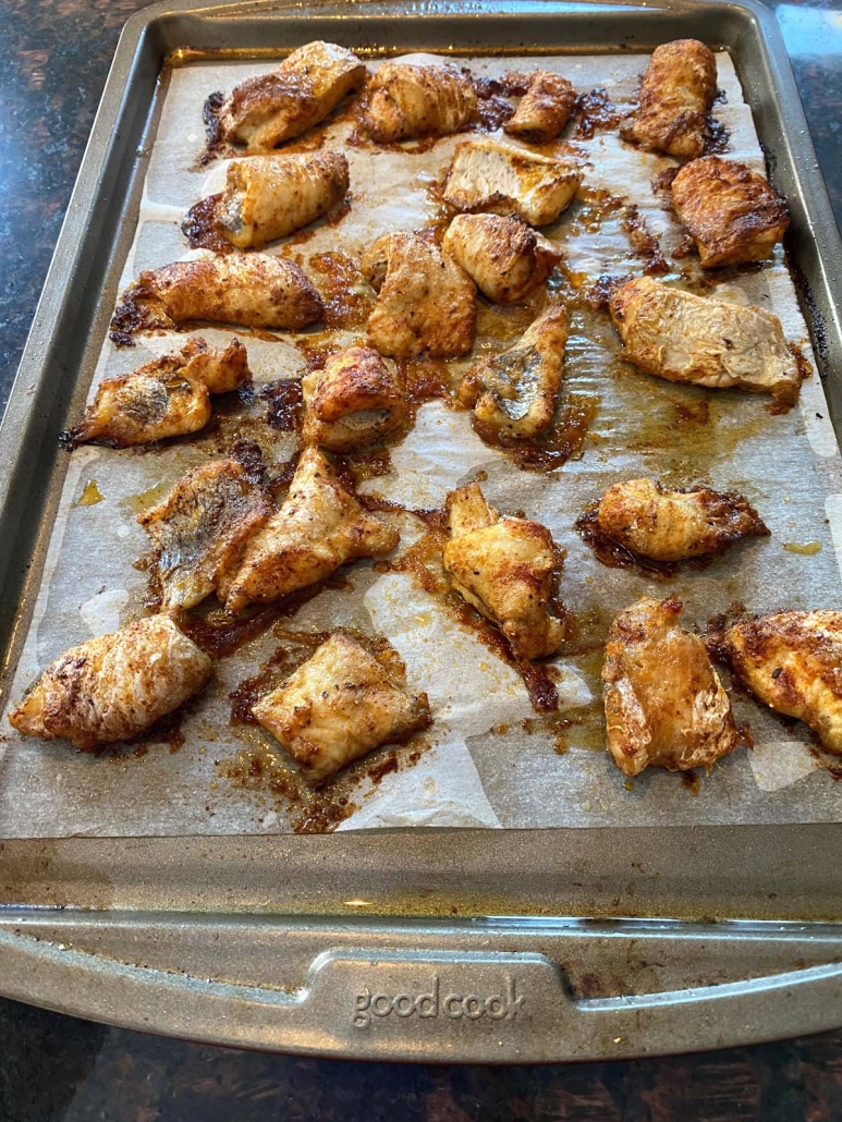 catfish nuggets baked on a cooking sheet