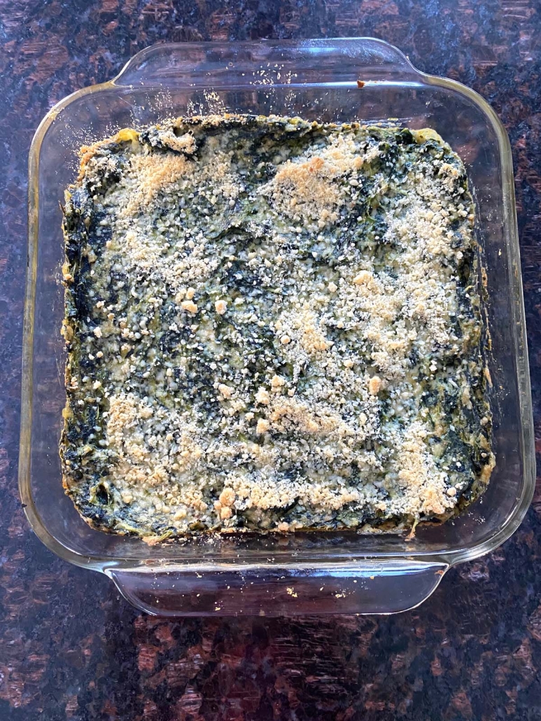 casserole dish with spinach casserole