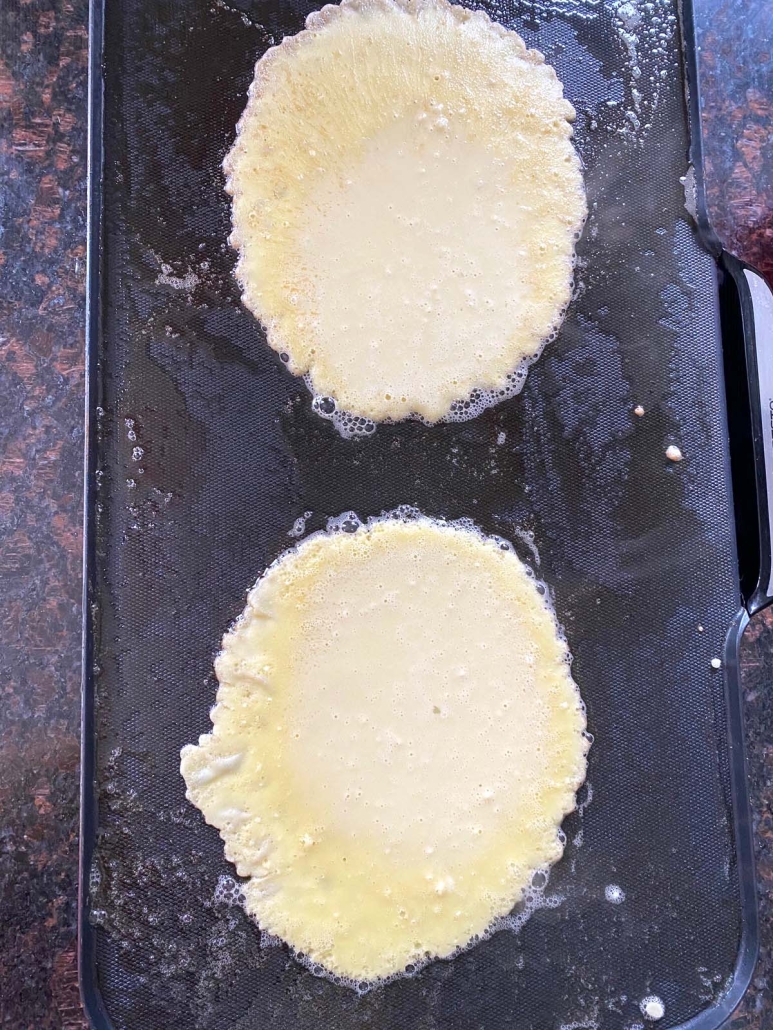 Swedish Pancake batter cooking on a griddle