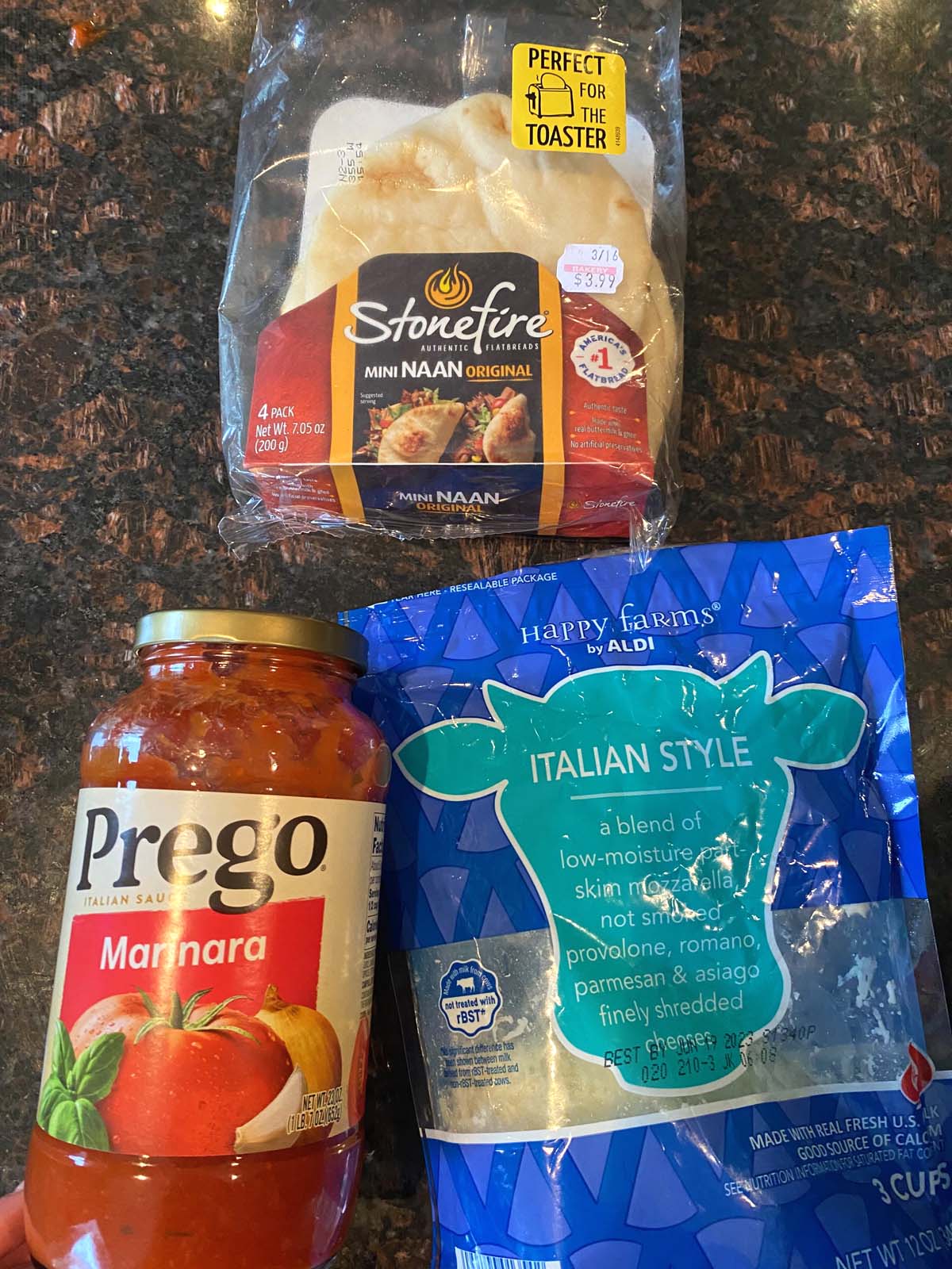 Naan, marinara sauce, and shredded Italian cheese.