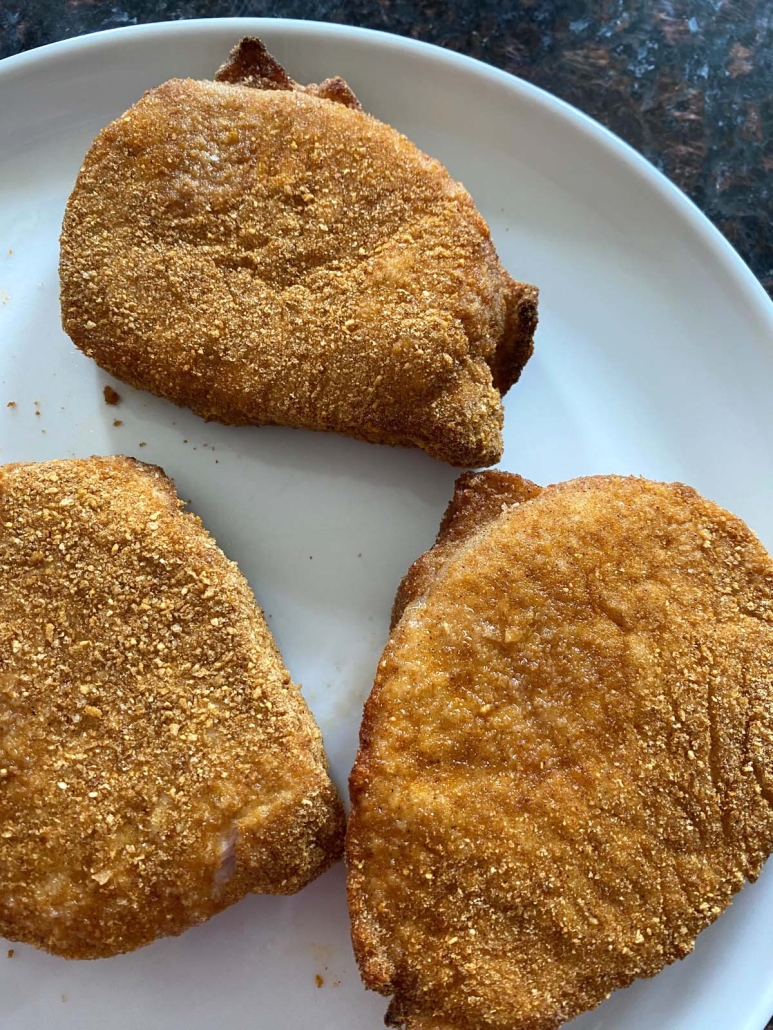 Air Fryer Shake N Bake Pork Chops on a plate