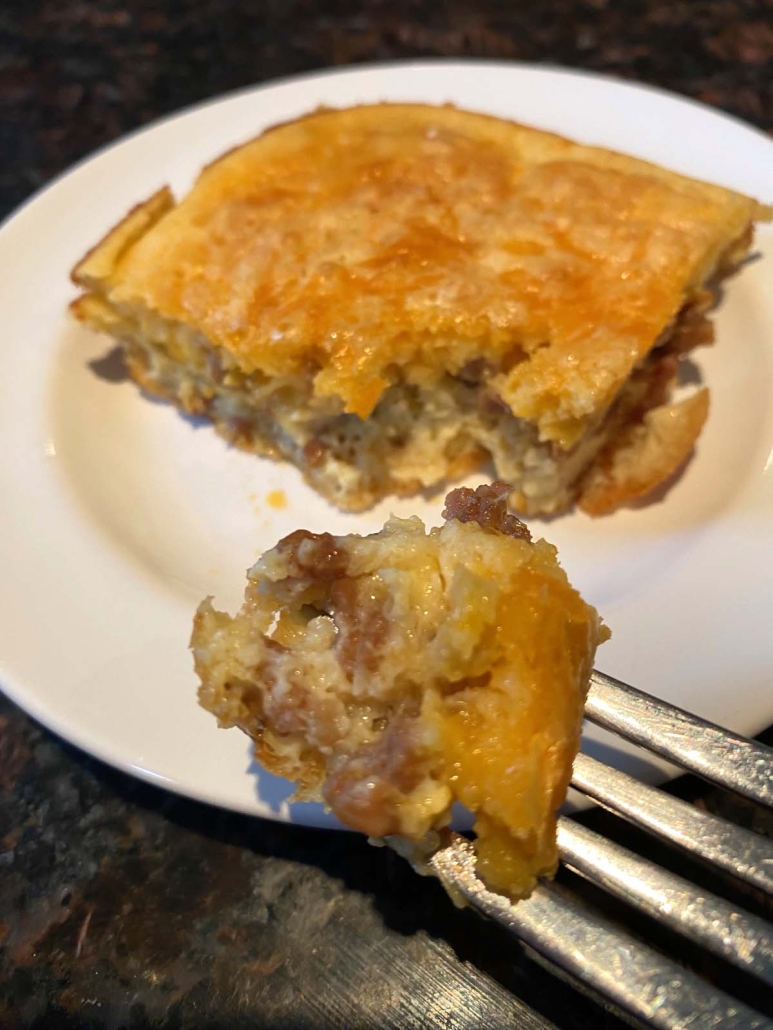 fork holding piece of Bisquick Breakfast Casserole