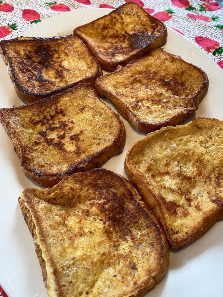 easy brioche french toast laid out on a serving platter