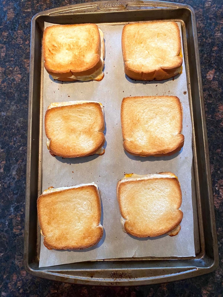 mozzarella and cheddar grilled cheese toasted up in the oven